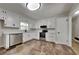 Modern kitchen featuring stainless steel appliances, white cabinets, and ample counter space for meal preparation at 4152 Berkshire Ct, Villa Rica, GA 30180