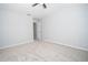 A bedroom features an open door and light-colored carpeting at 1851 Devon Dr, Atlanta, GA 30311