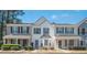 Charming townhome with a bay window, inviting entrance, well-maintained landscaping, and pleasing curb appeal at 1851 Devon Dr, Atlanta, GA 30311