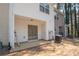 A cozy outdoor patio area with sliding glass doors, perfect for relaxation and easy access to the home's interior at 1851 Devon Dr, Atlanta, GA 30311