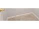 A stairwell features light carpeting and a brass doorknob at 1851 Devon Dr, Atlanta, GA 30311