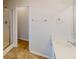 Bright bathroom showcasing a glass-enclosed shower, a vanity, and towel racks at 40 Kingfisher Walk, Covington, GA 30014