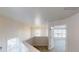 Hallway with a view of a bright and airy room with lots of natural light at 40 Kingfisher Walk, Covington, GA 30014