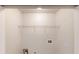 Functional laundry room with washer/dryer hookups and storage shelf at 40 Kingfisher Walk, Covington, GA 30014