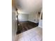 Comfortable living room featuring dark hardwood flooring, neutral paint, and great lighting at 4701 Flat Shoals Rd, Union City, GA 30291