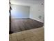 Spacious living room featuring hardwood flooring and neutral colors at 4701 Flat Shoals Rd, Union City, GA 30291