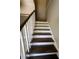 The staircase features wood steps and white risers at 4701 Flat Shoals Rd, Union City, GA 30291
