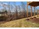 Showing the backyard with newly built deck support structure at 6355 Akins Way, Cumming, GA 30041