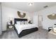 Inviting main bedroom with neutral tones, decorative wall paneling, and ample space at 1366 Creekside Nw Cir, Atlanta, GA 30318