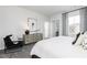 Serene main bedroom with neutral tones, dresser, and window with stylish curtains at 1366 Creekside Nw Cir, Atlanta, GA 30318
