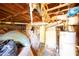 Unfinished basement exposing beams and various mechanical components at 3117 Janice Cir, Atlanta, GA 30341