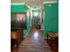 A cozy hallway featuring wooden floors and light teal walls at 3117 Janice Cir, Atlanta, GA 30341