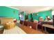 The open living area with teal walls offers a bright and inviting space at 3117 Janice Cir, Atlanta, GA 30341