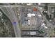 Aerial view of commercial real estate with multiple retailers and highway access at 3347 Stonecrest Ct, Atlanta, GA 30341