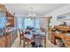 Elegant dining room featuring wood furnishings and natural light with a view into the kitchen at 3347 Stonecrest Ct, Atlanta, GA 30341