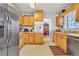 Functional kitchen with stainless steel appliances, wood cabinets, and ample counter space at 3347 Stonecrest Ct, Atlanta, GA 30341