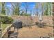 Outdoor patio with brick fence, and outdoor seating with dining and lounge areas at 3347 Stonecrest Ct, Atlanta, GA 30341