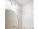 Clean bathroom featuring a large round mirror and simple, elegant fixtures at 3515 Devon Chase Rd, Atlanta, GA 30349