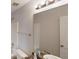 Bright bathroom featuring a granite counter top, a bath, and a mirror with great lighting at 3515 Devon Chase Rd, Atlanta, GA 30349
