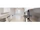 Updated kitchen featuring a stainless steel dishwasher, gas range, and light, bright cabinetry at 3515 Devon Chase Rd, Atlanta, GA 30349