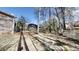Backyard with trees and lawn, with potential for garden or entertainment area at 3868 Prentiss Dr, Decatur, GA 30034