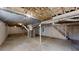 Unfinished basement with concrete floors and exposed ceiling, ready for customization and storage at 3868 Prentiss Dr, Decatur, GA 30034