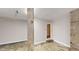 Spacious garage with a brick accent wall, providing ample room for parking and storage at 3868 Prentiss Dr, Decatur, GA 30034