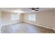 Spacious living room with ample natural light and contemporary flooring, ideal for relaxation at 3868 Prentiss Dr, Decatur, GA 30034