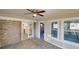 Sunroom with tiled floor and brick accents at 3868 Prentiss Dr, Decatur, GA 30034