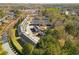 Overhead shot showcasing community townhomes bordered by mature trees and landscaping, plus convenient parking at 4917 Walden Lake Sq, Decatur, GA 30035