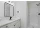 The bathroom is beautifully designed and features a shower and vanity sink with vanity at 4917 Walden Lake Sq, Decatur, GA 30035