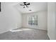 Spacious bedroom with vaulted ceilings and lots of natural light streaming through a large window at 4917 Walden Lake Sq, Decatur, GA 30035