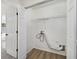 The walk-in closet features hardwood floors and a rod and wire rack for hanging storage at 4917 Walden Lake Sq, Decatur, GA 30035