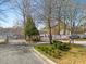 Gated community entrance with brick signage and lush landscaping welcoming residents and guests at 4917 Walden Lake Sq, Decatur, GA 30035