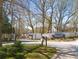 Gated community entrance with well-maintained landscaping and signage for a welcoming feel at 4917 Walden Lake Sq, Decatur, GA 30035
