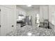 Close up of a modern kitchen showcasing granite countertops and stainless steel oven and cooktop at 4917 Walden Lake Sq, Decatur, GA 30035
