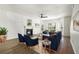 Nicely staged living room with a fireplace, windows, hardwood floors, and plenty of light at 4917 Walden Lake Sq, Decatur, GA 30035