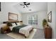 Comfortable main bedroom with large window and tastefully coordinated modern decor at 4917 Walden Lake Sq, Decatur, GA 30035