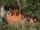 Aerial view of a property under construction surrounded by trees, showcasing lot layout and natural setting at 3240 Miller Bottom Rd, Conyers, GA 30012