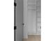 Bright, open walk-in closet with shelving and modern design features at 3240 Miller Bottom Rd, Conyers, GA 30012
