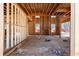 Interior view of new home construction showing exposed framing and stud walls at 3240 Miller Bottom Rd, Conyers, GA 30012