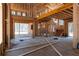 Interior view of new home construction featuring exposed framing and staircase at 3240 Miller Bottom Rd, Conyers, GA 30012