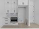 Kitchen area features stainless steel oven and plenty of white cabinet storage space at 3240 Miller Bottom Rd, Conyers, GA 30012