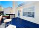 Enjoy outdoor living on the back deck, furnished with a table and chairs, adjacent to the home's exterior at 4962 Newpark Nw Ln, Acworth, GA 30101