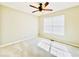 Bedroom with neutral carpet and walls and a large window with natural light at 4962 Newpark Nw Ln, Acworth, GA 30101