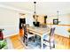 Well-lit dining area showcases a wooden table set and tasteful decor, perfect for both casual and formal dining at 4962 Newpark Nw Ln, Acworth, GA 30101