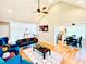 Open-concept living space with high ceilings, blending modern furnishings and decor for a stylish, airy feel at 4962 Newpark Nw Ln, Acworth, GA 30101