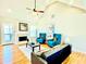 Bright living room features a high ceiling, cozy fireplace, and stylish furnishings, creating a welcoming atmosphere at 4962 Newpark Nw Ln, Acworth, GA 30101