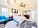 Spacious main bedroom with tray ceiling, ceiling fan, and ensuite bathroom at 4962 Newpark Nw Ln, Acworth, GA 30101