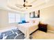 Bright and airy main bedroom with ceiling fan and comfortable furniture at 4962 Newpark Nw Ln, Acworth, GA 30101